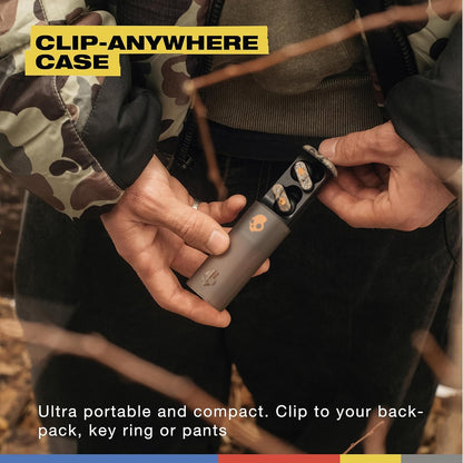 Skullcandy Dime Evo Wireless Earbuds, Bluetooth Headphones, Noise Isolating Fit, Up to 36 Hours Battery, Microphone, Easy Carry with Clip-Anywhere Case - Realtree APX Black/Orange